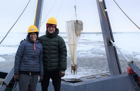 Clare Bird and Flor Vermassen on IB Oden, with multinet deployment in the background