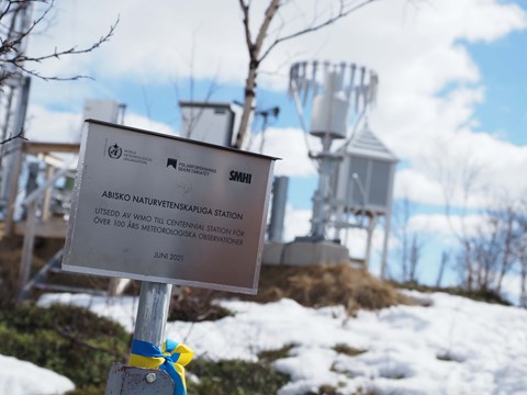 Sign in front of Abisko automatic station showing the designation as a Centennial Station by the WMO.