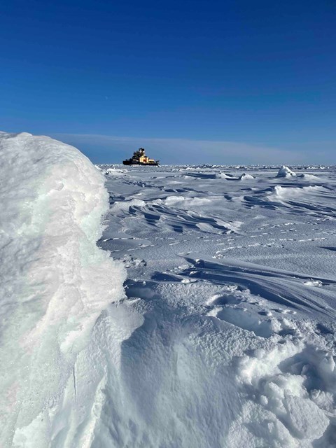 The icebreaker Oden is visible in the distance.