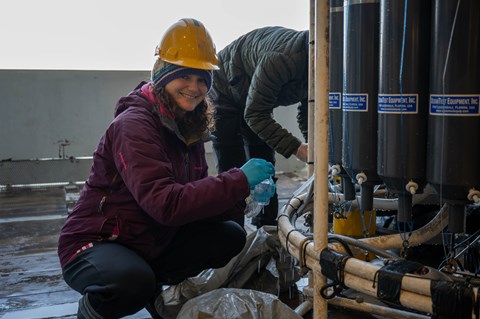 Sonja Gindorf, PhD student at the Department of Environmental Science (ACES) at Stockholm University, takes water samples from a CTD during the Arctic Ocean Research Cruise 2023 with RV Kronprins Haakon