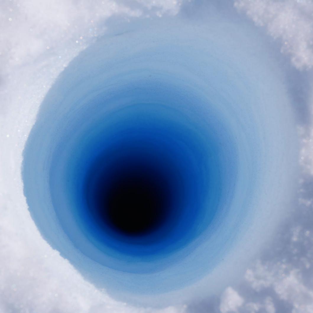 Drill holes during snow core work in Antarctica. Photo: Ian Brown
